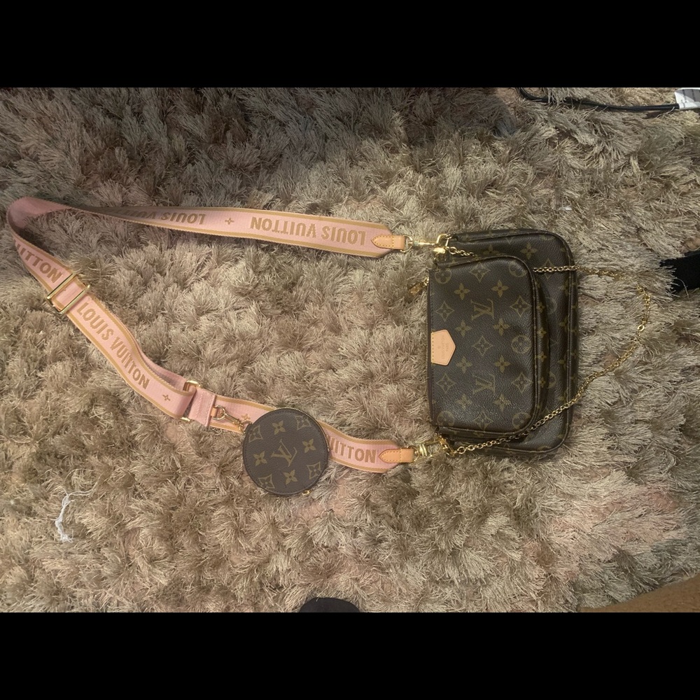 Louis Vuitton purse. (Most likely not real)